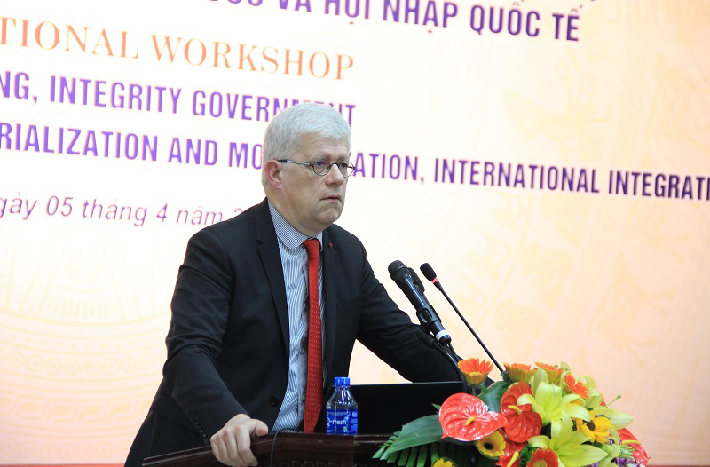 Mr. Jean Francois Verdier, ... delivers a presentation in the seminar